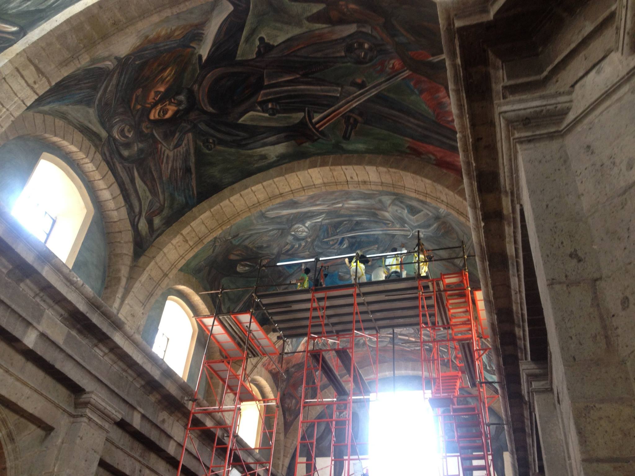 orozco mural with scaffold